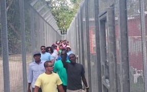 Detainees gather for the 60th day of protest on Manus Island.