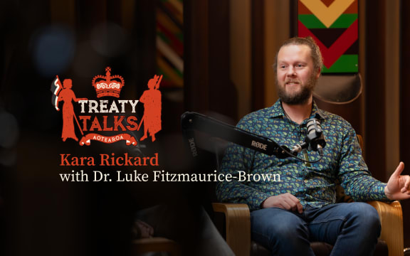 Crest referencing the nz coat of arms but featuring silhouette of a woman holding tino rangatiratanga flag and a crown with māori designs and the word Aotearoa at the base.
Colours are mainly red with some cream, all on a black background.
Text reads Kara Rickard with Dr. Luke Fitzmaurice-Brown. 
Image of guest in conversation with host Kara (who is out of shot)