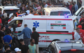 Ambulances come to the Syrian border to carry the bodies of those who lost their lives as a result of the sinking of a migrant boat off the Syrian coast as the death toll has risen to 75 in Arida, Lebanon on 23 September, 2022.