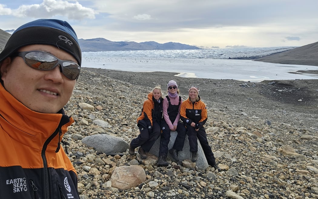 Microbial ecologist Dr Charles Lee and phD students in Antarctica.