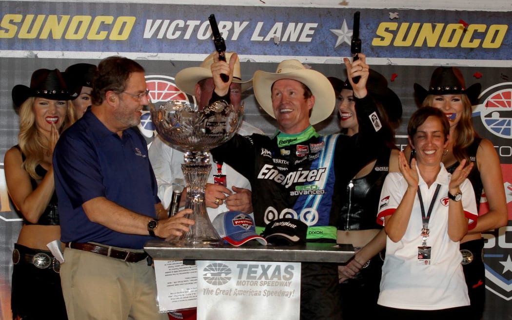 Scott Dixon celebrates his victory