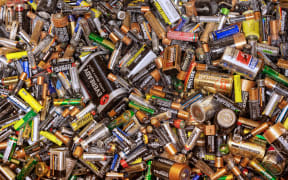 Many dead batteries gathered for recycling.