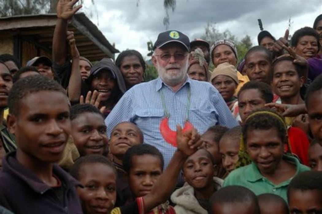 TI PNG's Lawrence Stephens, (middle).