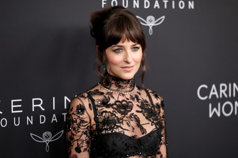 Dakota Johnson attends a charity event with the Kering Foundation in New York.