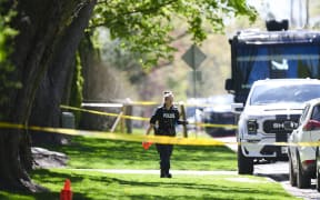 Toronto police patrol outside the home of Canadian rapper Drake after reports of a shooting early on May 7, 2024, according to media reports. The home was cordoned off by police after police reported a pre-dawn shooting near the property.