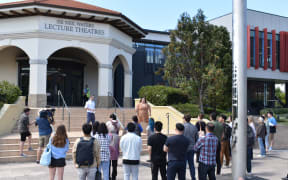 Staff and student protesters at Massey University's Auckland campus demonstrate against proposed cuts, and call for the resignation of Vice Chancellor Jan Thomas.