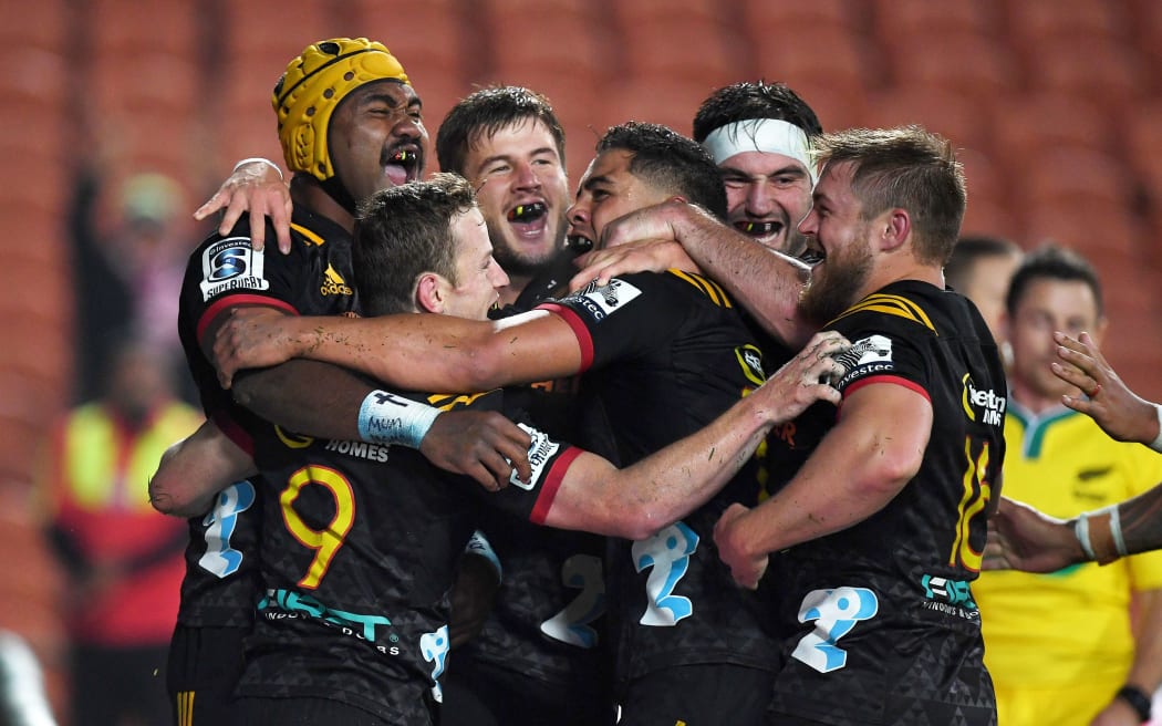 Chiefs celebrate Brad Weber's try.