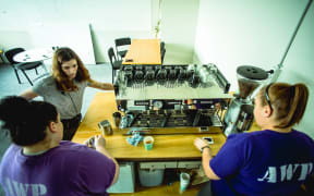 Lauren Tennent and two inmates on Trade School Industries' barista training course, Arohata prison.