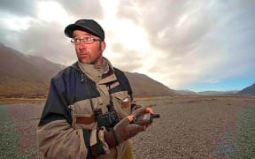 Peter Langlands on Rangitata researching birds.
