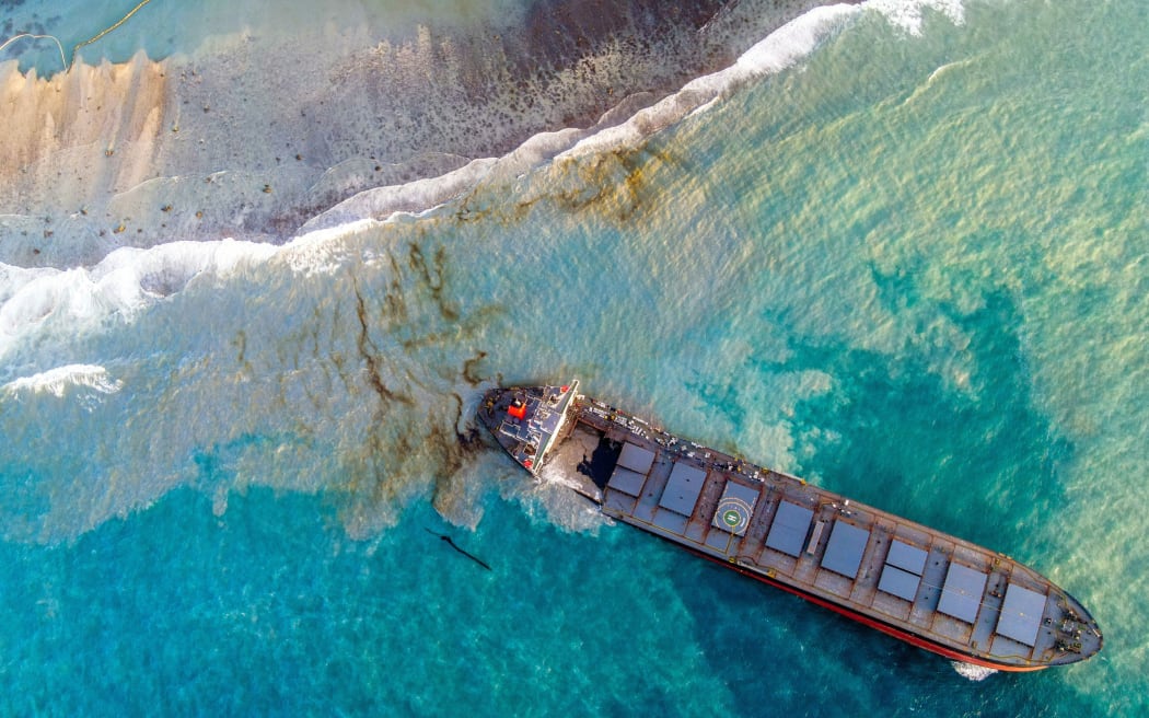 An aerial view taken on August 15, 2020 shows the vessel MV Wakashio, belonging to a Japanese company but Panamanian-flagged that had run aground near Blue Bay Marine Park, Mauritius three weeks ago.