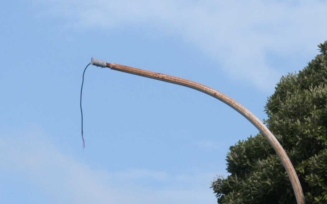 The lamp has fallen off this Wellington street light due to a faulty adaptor.