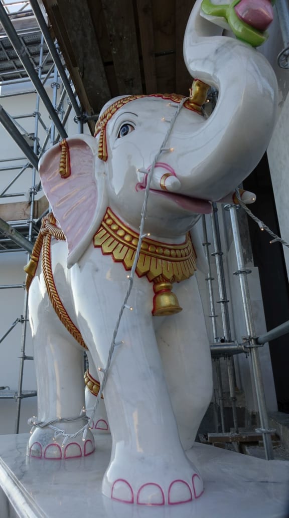 Large elephant statues adorn the main entrance.