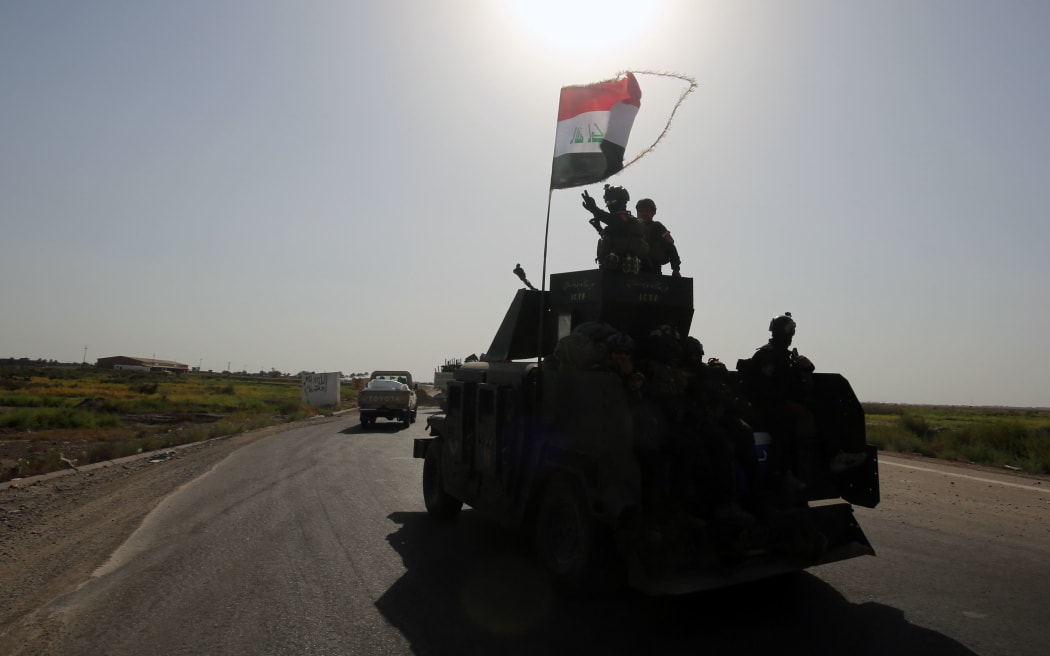 Iraq's counter-terrorism service (CTS) reach al-Sejar village in Iraq's Anbar province, on the boundaries of Fallujah.