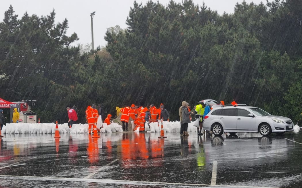 People continue to give out sandbags at Dunedin's ice rink.