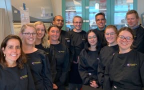 Members of the University of Otago Containment Lab team working on COVID