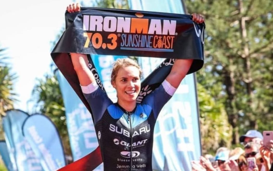 Hannah Wells crosse the finish line on the Sunshine Coast in Australia,