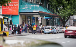 People queue outside Auckland City Mission in the lead-up to Christmas, 2015. City Missioner Chris Farrelly says school holidays are a particular time of hardship,