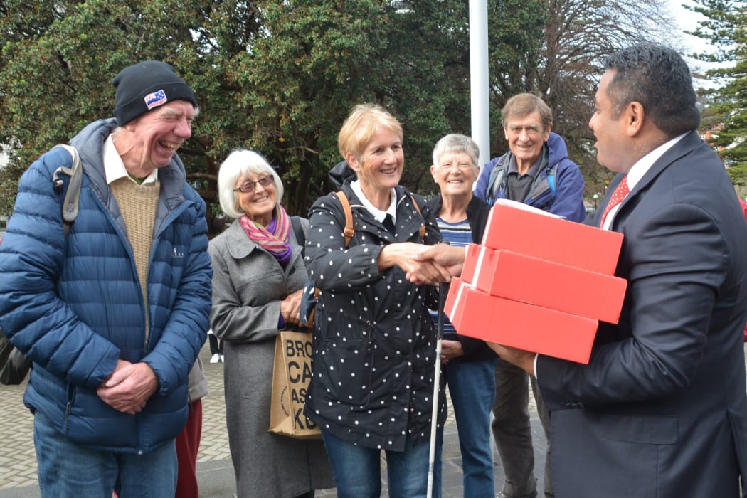 Kāpiti local MP Kris Faafoi met with residents, who were campaigning for a hospital, outside parliament on 13 June, 2018.