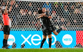 Malia Steinmetz of New Zealand and Co-captain Ria Percival of New Zealand celebrate their 1-0 win over Norway