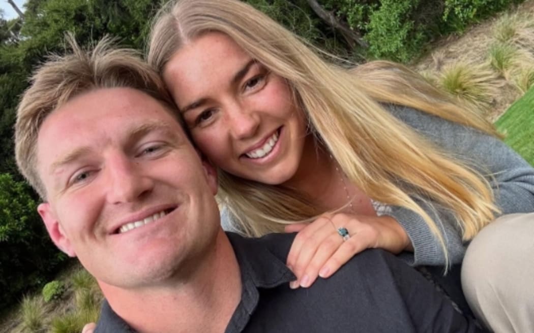 Jordie Barrett and Alice Marshall celebrate their engagement.