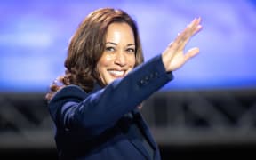 Vice President Kamala Harris is speaking at the Sigma Gamma Rho Sorority Inc.'s 60th International Biennial Boule at George R. Brown Convention Center in Houston, Texas, on July 31, 2024. Pictured: Vice President Harris is waving at the crowd as she is walking on stage. (Photo by Reginald Mathalone/NurPhoto) (Photo by Reginald Mathalone / NurPhoto / NurPhoto via AFP)