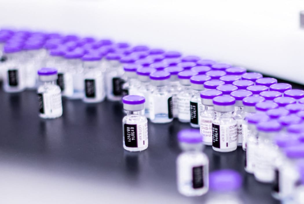 Vials of the Pfizer-BioNTech Covid-19 vaccine are prepared for packaging at the company’s facility in Puurs, Belgium.