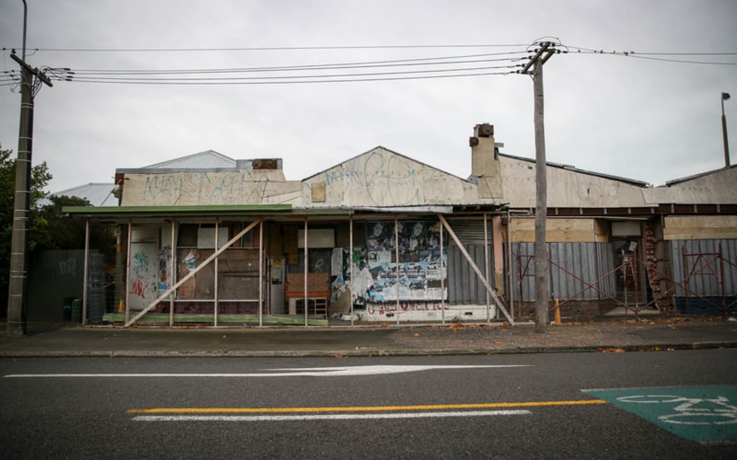 Boarded up shops down eastern Worcester Street.