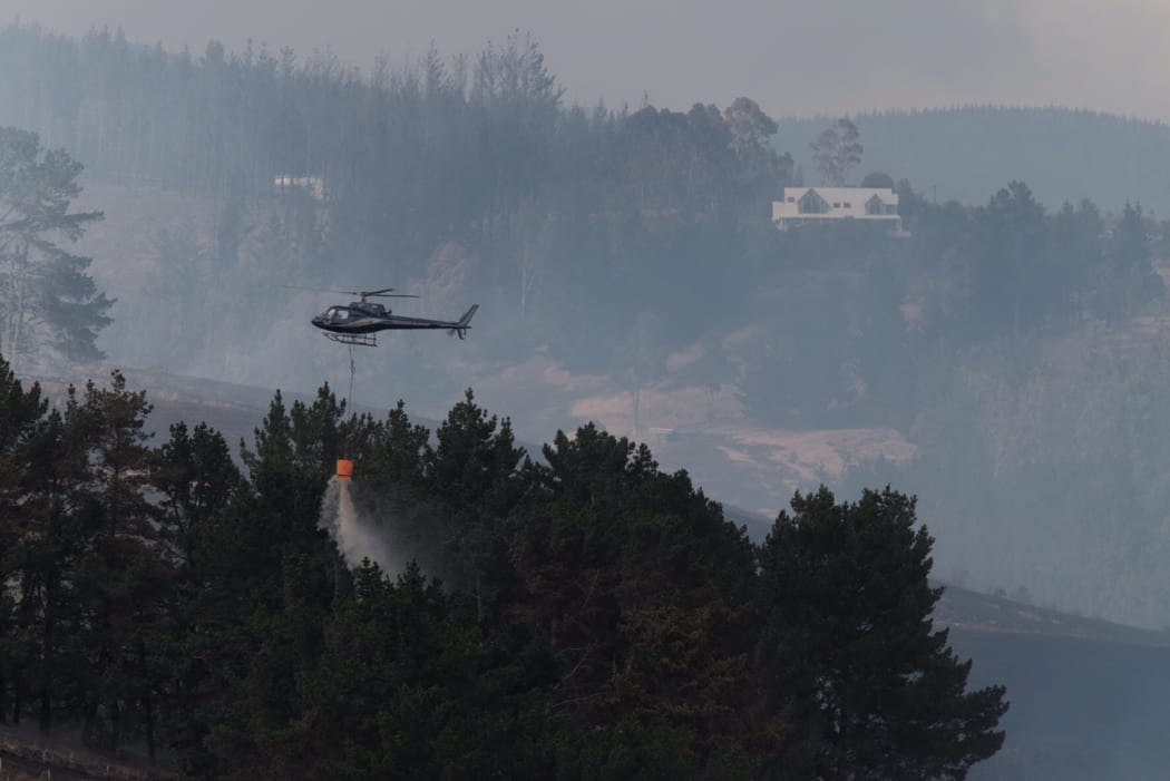 Helicopters battle the Port Hills fire