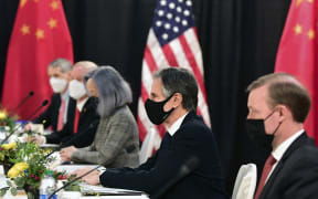The US delegation led by Secretary of State Antony Blinken, flanked by US National Security Advisor Jake Sullivan , face their Chinese counterparts at the opening session of US-China talks at the Captain Cook Hotel in Anchorage, Alaska.