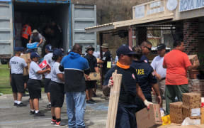Donation drive supplies being offloaded in Rota