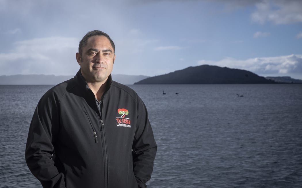 Arapeta Tahana stands at Lake Rotorua. Photo / Andrew Warner