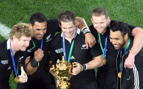 Adam Thomson, Jerome Kaino, Richie McCaw, Kieran Reid and Victor Vito pose for a photo with The Webb Ellis Cup. 2011.