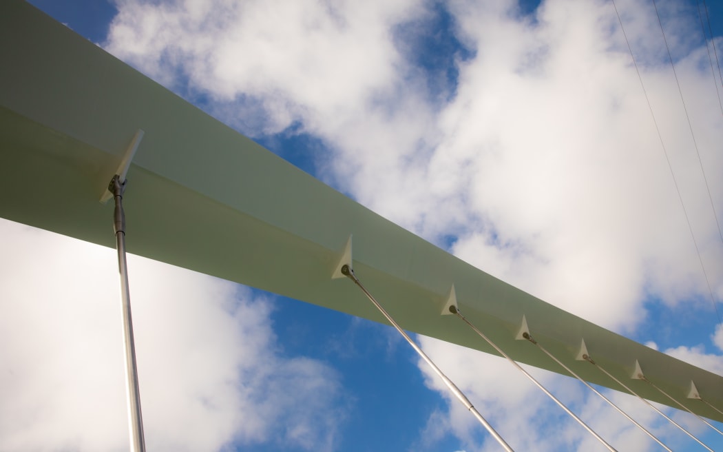 The steel arch on Ngā Hau Māngere - the new Māngere pedestrian bridge.