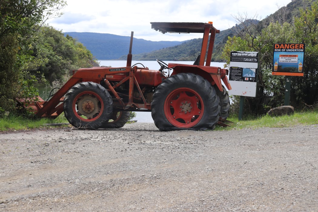Tractor blocking entrance to Lake Waikaremoana.