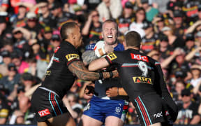 Mitch Barnett is tackled. Penrith Panthers v New Zealand Warriors. NRL Rugby League Finals, BlueBet Stadium, Penrith, NSW, Australia, Saturday 9th September 2023.  Copyright Photo: David Neilson / www.photosport.nz