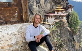 Luca is seen here at Bhutan's Tiger's Nest Monastery