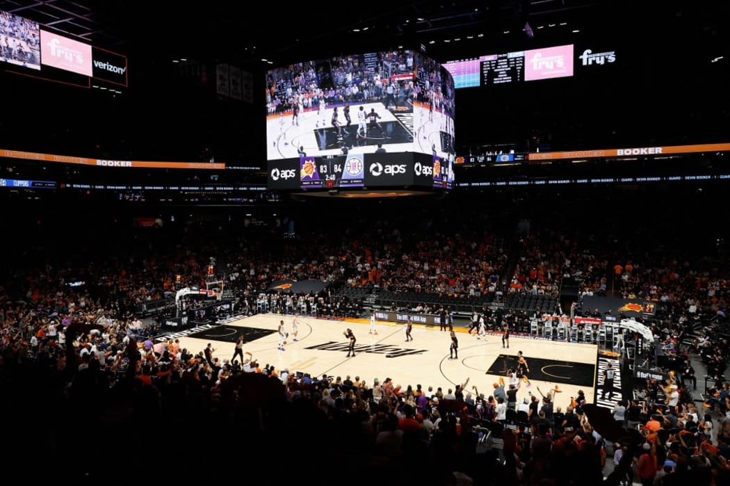 PHOENIX, ARIZONA - JUNE 20: Fans cheer after the Phoenix Suns scored against the LA Clippers during the second half of game one of the Western Conference Finals at Phoenix Suns Arena on June 20, 2021 in Phoenix, Arizona.