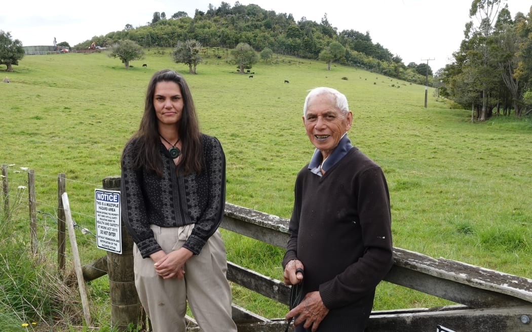 Ngāti Kahu o Torongare spokeswoman Nicki Wakefield and kaumatua Richard Shepherd, with Onoke Pā in the distance.
