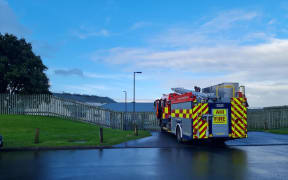 Police and Fire and Emergency remain at Korowai Manaaki Youth Justice Residence in Auckland's Wiri after a group of young people took part in a standoff on Saturday. Five people remained on the roof or in its cavity as of Sunday morning.