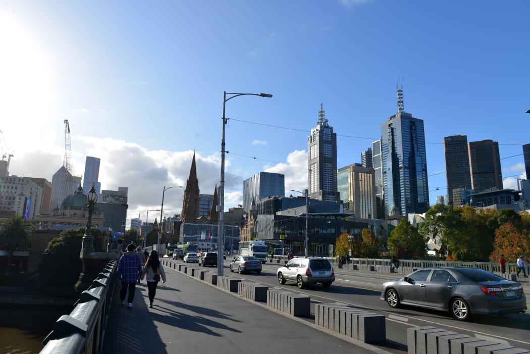 People walk at parks and streets as the city partly gets crowded after people leave their homes as Victoria begins to ease coronavirus (COVID-19) restrictions