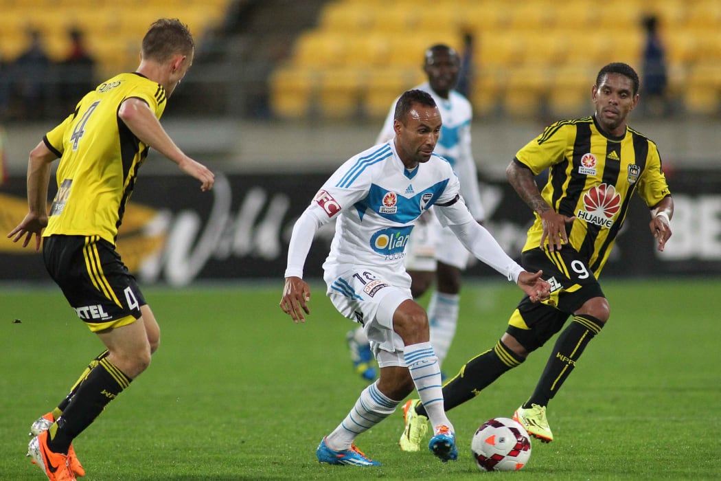Former Australian football striker Archie Thompson playing for Melbourne Victory in 2014.
