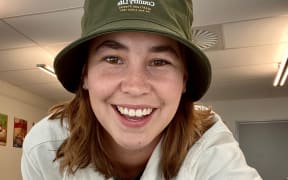 Country Life producer Leah Tebbutt wearing the 25th birthday celebratory bucket hat.