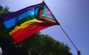 A Progressive Pride Flag.
