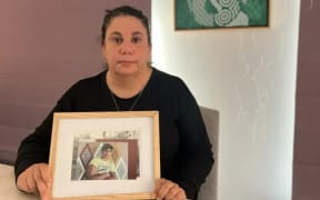 Raylene Nixon with a photo of her son Steven Nixon-McKellar