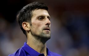 Novak Djokovic of Serbia looks on as he plays against Jenson Brooksby of the United States during his Mens Singles  USTA Billie Jean King National Tennis Center on September 06, 2021 in the Flushing neighborhood of the Queens borough of New York City.