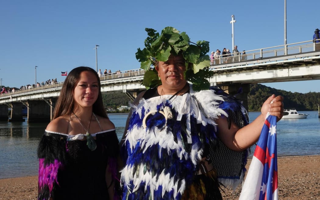 Joey Rapana and his daughter Kailyn, 16. Joey has been coming to Waitangi all his life and says it's the biggest he's seen since 1990. He normally paddles in the waka parade but this year he feels the hikoi is more important. He wants to show his concern about what he sees as government moves to diminish te reo.