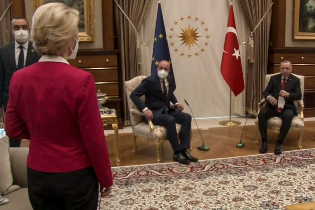 This video frame grab taken from footage released by The Turkish Presidency shows Turkish President Recep Tayyip Erdogan (R) receiving EU Council President Charles Michel (C) and President of EU Commission Ursula von der Leyen (L)