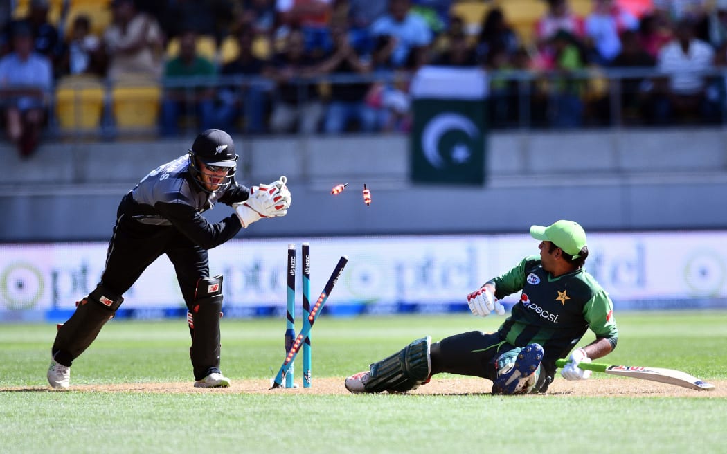 Blackcaps wicket-keeper Glenn Phillips completes the stumping of Pakistan captain Sarfaraz Ahmed.