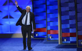 Bernie Sanders urged his supporters to back Hillary Clinton.