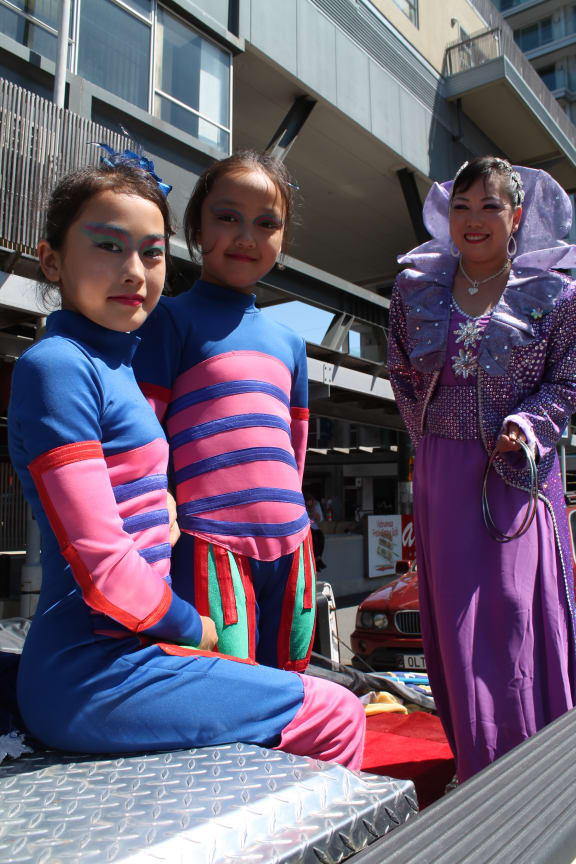 Total dedication (Co-founder Judi Hou and two young acrobats)